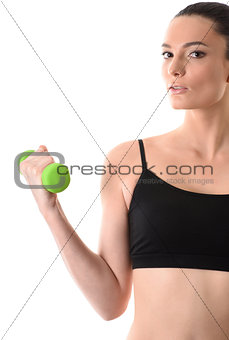 Portrait of fitness woman working out with dumbbell