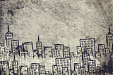 Concrete gray wall with fissure. Sketch of buildings