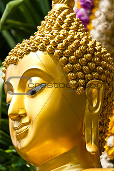Golden Buddhist statue face