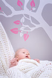 Cute baby in bedroom