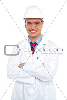 Male architect wearing safety glasses and hard hat