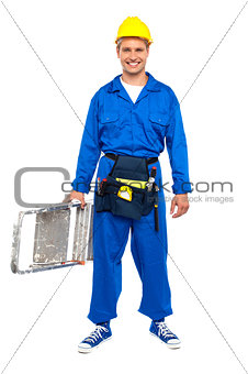 Construction worker ready with stepladder
