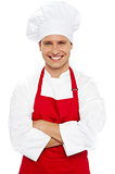 Portrait of a smiling chef with arms crossed