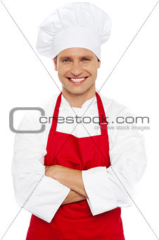 Portrait of a smiling chef with arms crossed
