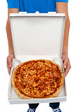 A picture of an  open pizza box.