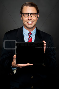 Male representative sharing newly launched tablet