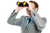 Businessman viewing through binoculars