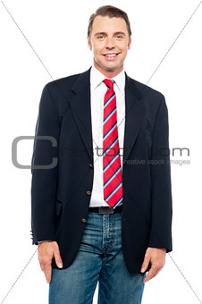 Smiling young businessperson posing casually