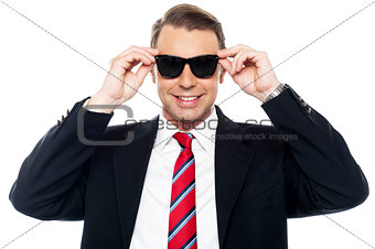 Stylish handsome businessman wearing shades