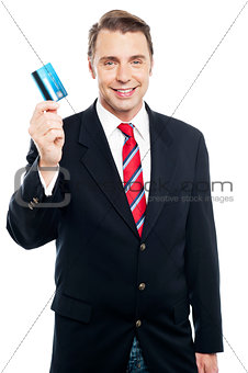An entrepreneur showing debit card to camera