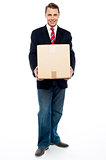 Business representative holding cardboard box