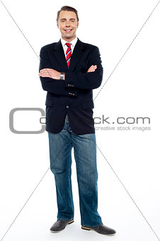 Confident young consultant with his arms crossed