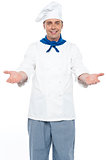 Smiling chef posing with his arms wide open