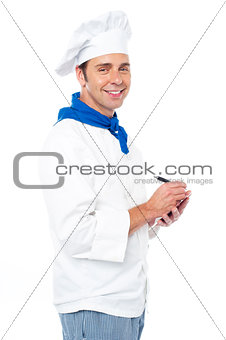 Chef taking down the order from customers