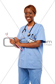 Female surgeon writing medical prescription