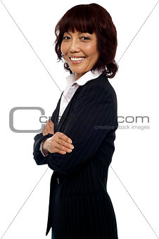Side pose of matured asian female consultant