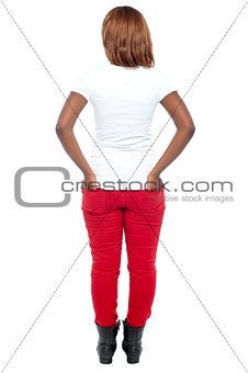 Rear view of african model. Hands in her back pocket