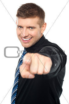 Joyous business consultant pointing at you