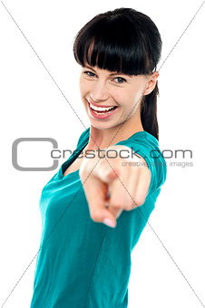 Casual middle aged woman pointing at the camera