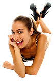 Excited female bikini model with cheeky expression