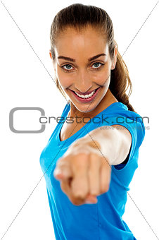 Lady pointing her finger towards the camera