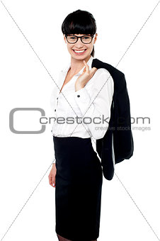 Young business lady holding coat over her shoulders
