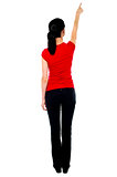 Back pose of woman in casuals pointing away
