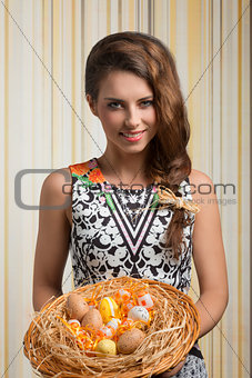 smiling girl with easter eggs 