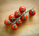tomatoes on brown textured wood