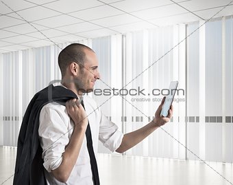 Businessman looks results to mobile