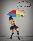 Clowns with rainbow umbrella