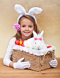 Happy spring girl with easter basket