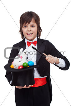 Young magician performing an easter trick