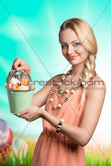 lovely spring woman with easter eggs 