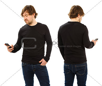 Man wearing blank black shirt holding phone