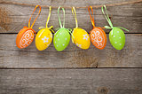 Easter eggs on wooden table background