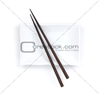 Empty plate and chopsticks