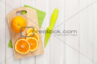 Sliced orange on cutting board