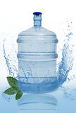 big bottle with clean blue water drink and green foliage 