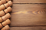 Champagne wine corks over wooden table
