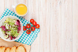 Healthy breakfast with salad, tomatoes and toasts
