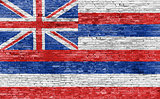 Flag of Hawaii on brick wall