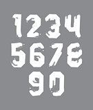 Stroked white numbers set drawn with real ink brush, vector chil