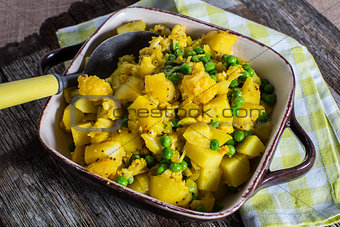 Vegetarian casserole potato peas cauliflower