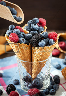 Fresh berries in waffle cone