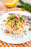 Fresh vegetable and crab salad with mayonnaise
