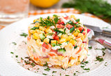 Fresh vegetable and crab salad with mayonnaise
