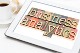 business analytics typography on tablet