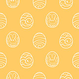 Easter seamless background. Decorated eggs on a yellow backgroun