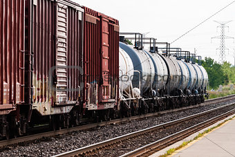 Freight train tanker cars in perspective